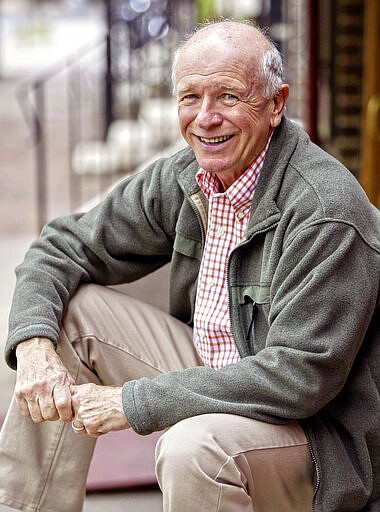 FILE - This May 14, 2006 file photo shows Tony Award winning playwright Terrence McNally in front of the Philadelphia Theater Company  in Philadelphia. McNally, one of America&#146;s great playwrights whose prolific career included winning Tony Awards for the plays &quot;Love! Valour! Compassion!&quot; and &quot;Master Class&quot; and the musicals &quot;Ragtime&quot; and &quot;Kiss of the Spider Woman,&quot; died Tuesday, March 24, 2020, of complications from the coronavirus. He was 81. (AP Photo/H. Rumph Jr)