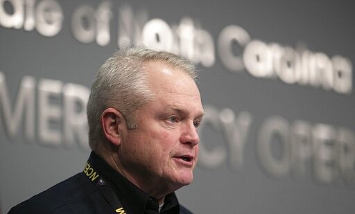 Mike Sprayberry, North Carolina Director of Emergency Management fields questions during a press briefing to update the public on the COVID-19 and coronavirus on Tuesday, March 24, 2020 at the Emergency Operations Center in Raleigh, N.C./The News &amp; Observer via AP)