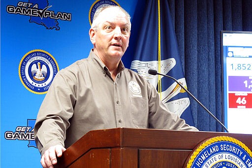 Louisiana Gov. John Bel Edwards talks about the state's response to the coronavirus outbreak, Tuesday, March 24, 2020, in Baton Rouge, La. The Democratic governor requested a federal disaster declaration for his state, which has one of the nation's highest per-capita rates of virus infection. (AP Photo/Melinda Deslatte)