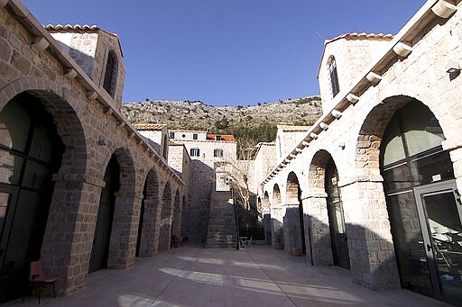 This Tuesday, March 17, 2020 photo shows the Lazarettos complex, called Lazareti in Croatian, in Dubrovnik, Croatia. Just outside the majestic walls of Croatia&#146;s medieval citadel city of Dubrovnik lies a cluster of small stone houses that today serve as an art and clubbing hub. But as the coronavirus spreads across the globe, many are being reminded of the Lazareti complex's original use as an ancient quarantine area that helped keep infectious diseases away. (AP Photo/Darko Bandic)