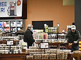 Wolf reopens gun shops, orders more residents to stay home