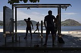 AP PHOTOS: Isolated fitness fans turn to Internet, outdoors
