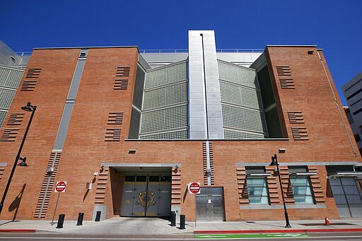 This March 21, 2020, file photo shows the Maricopa County 4th Avenue Jail in downtown Phoenix. In an effort to guard against the risks of COVID-19, Maricopa County Sheriff Paul Penzone has raised the possibility of getting courts to temporarily suspend the sentences of nonviolent misdemeanor inmates who are allowed to leave jail to go to work. Last week, Penzone said he wouldn't prematurely release inmates without court orders. (AP Photo/Ross D. Franklin, File)