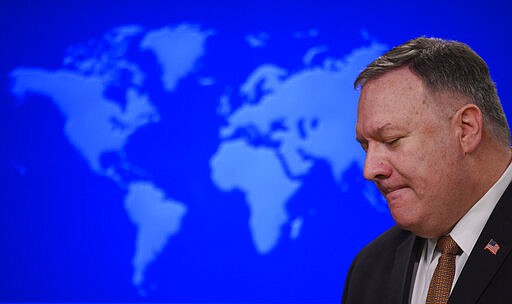 Secretary of State Mike Pompeo speaks during a news conference at the State Department on Wednesday, March 25, 2020, in Washington. Pompeo said Wednesday that the Group of Seven members were all aware of China's &quot;disinformation campaign&quot; regarding the coronavirus outbreak, as the two countries dispute the origins of the disease. (Andrew Caballero-Reynolds/Pool Photo via AP)