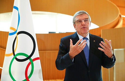 Thomas Bach, resident of the International Olympic Committee (IOC), attends an interview after the decision to postpone the Tokyo 2020 Olympic Games because of the coronavirus disease (COVID-19) outbreak, in Lausanne, Switzerland, on Wednesday, March 25, 2020. (Denis Balibouse/Keystone via AP/pool)