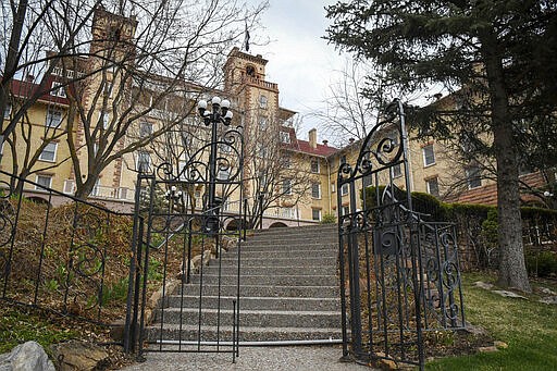 The historic Hotel Colorado in Glenwood Springs, Colo., closed its doors on Wednesday, March 25, 2020, in response to the COVID-19 outbreak. The hotel hopes to reopen on May 15, 2020. (Chelsea Self/Glenwood Springs Post Independent via AP)