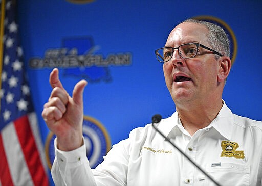 Louisiana Gov. John Bel Edwards speaks at a press conference regarding the spread of COVID-19 in the state, Wednesday, March 25, 2020, in Baton Rouge, La. Nearly 1,800 people in the state were confirmed to have the COVID-19 disease caused by the coronavirus, according to figures from Louisiana's health department, an increase of 400 from the previous day. (Hilary Scheinuk/The Advocate via AP)