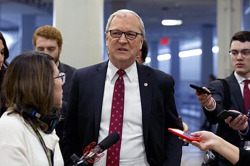 FILE - In this Jan. 28, 2020 file photo, Sen. Kevin Cramer, R-N.D. talks to reporters on Capitol Hill in Washington. Cramer says he's sorry for a late-night tweet in which he used an offensive term to describe House Speaker Nancy Pelosi. Cramer blamed autocorrect for the tweet, which he deleted soon after posting it Tuesday, March 24. (AP Photo/Jose Luis Magana File)