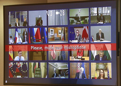 European Union leaders participate in a videoconference call with European Council President Charles Michel at the European Council building in Brussels, Tuesday, March 10, 2020. EU leaders held a videoconference Tuesday to coordinate efforts across the 27-nation bloc in the hopes of slowing down the spread of the coronavirus. For most people, the new coronavirus causes only mild or moderate symptoms, such as fever and cough. For some, especially older adults and people with existing health problems, it can cause more severe illness, including pneumonia. (Stephanie Lecocq, Pool Photo via AP)