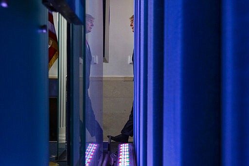 President Donald Trump arrives to speak about the coronavirus in the James Brady Briefing Room, Tuesday, March 24, 2020, in Washington. (AP Photo/Alex Brandon)