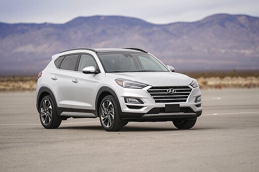 This undated photo from Hyundai shows the Tucson, a small SUV that features a surround-view monitor, which provides drivers with a bird's-eye view of the vehicle when parking. (Courtesy of Hyundai Motor America via AP)