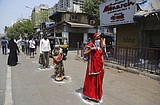 Police struggle to enforce India's sweeping virus lockdown