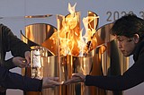 Tokyo's delayed Olympics: Who pays bills for another year?