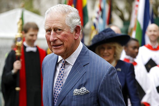 FILE - In this Monday, March 9, 2020 file photo, Britain's Prince Charles and Camilla the Duchess of Cornwall, in the background, leave after attending the annual Commonwealth Day service at Westminster Abbey in London, Monday, March 9, 2020. Prince Charles, the heir to the British throne, has tested positive for the new coronavirus. The prince&#146;s Clarence House office reported on Wednesday, March 25, 2020 that the 71-year-old is showing mild symptoms of COVID-19 and is self-isolating at a royal estate in Scotland. For most people, the coronavirus causes mild or moderate symptoms, such as fever and cough that clear up in two to three weeks (AP Photo/Kirsty Wigglesworth, File)