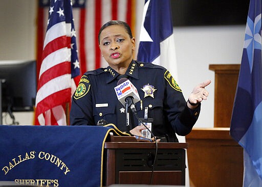 Dallas County Sheriff Marian Brown speaks during a press conference at the Frank Crowley Courthouse, Wednesday, March 25, 2020, in Dallas. Officials say an inmate at the Dallas County jail has tested positive for the coronavirus. The new coronavirus causes mild or moderate symptoms for most people, but for some, especially older adults and people with existing health problems, it can cause more severe illness or death. (Tom Fox/The Dallas Morning News via AP)