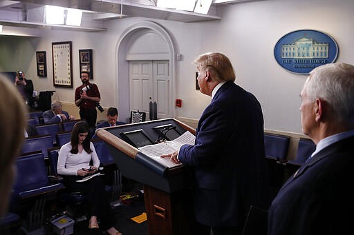 President Donald Trump speaks about the coronavirus in the James Brady Briefing Room, Thursday, March 26, 2020, in Washington. (AP Photo/Alex Brandon)