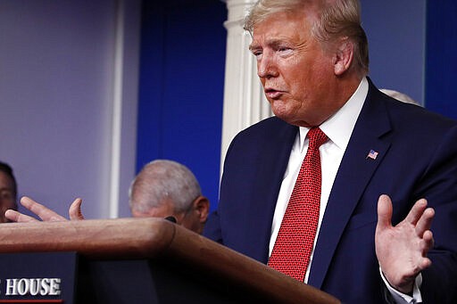 President Donald Trump speaks about the coronavirus in the James Brady Briefing Room, Wednesday, March 25, 2020, in Washington. (AP Photo/Alex Brandon)