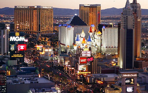 FILE - This Oct. 20, 2009 file photo shows casinos on the Las Vegas Strip. Before closing in mid-March due to the coronavirus outbreak, Nevada casinos had a very good February _ taking in more than $1 billion in house winnings for the third month in a row, regulators reported Thursday, March 26, 2020. (AP Photo/Isaac Brekken, File)