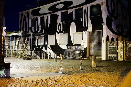 In this March 21, 2020, photo, an entrance door of music club Watergate is closed in Berlin, Germany. The nightclubs in the German capital have decided to keep the beat going &#151; at least online. The first livestream of the &#147;United We Stream&#148; project took place last week from the stage of Watergate, a nightclub housed in a former office building. (AP Photo/Markus Schreiber)