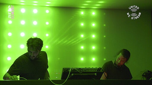 In this March 18, 2020, frame from video provided by Rundfunk Berlin-Brandenburg, DJ duo Gheist performs a set as part of the &quot;United We Stream&quot; event at the club Watergate in Berlin. The nightclubs in the German capital have decided to keep the beat going &#151; at least online. Berlin's nightclubs were closed on March 13 in an attempt to slow the spread of the coronavirus. In response, some clubs formed a streaming platform to let DJs, musicians and artists continue to perform. (Rundfunk Berlin-Brandenburg via AP)