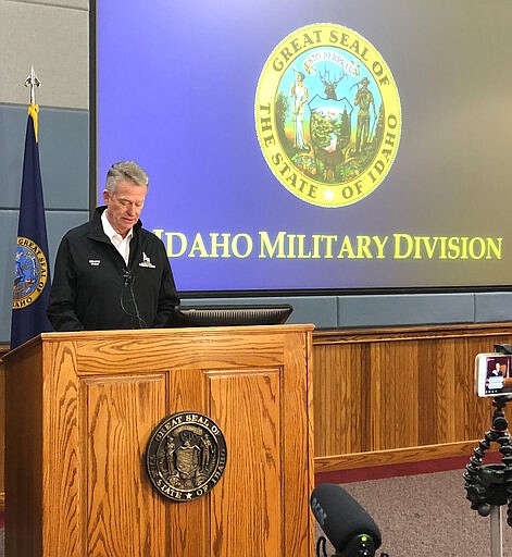 Idaho Gov. Brad Little issues a 21-day stay-at-home order to prevent the spread of the coronavirus from the Idaho Military Division headquarters in Boise, Idaho, on Wednesday, March 25, 2020. Idaho has more than 91 confirmed cases of COVID-19, the illness caused by the coronavirus, spread throughout the state. The governor also issued a new &quot;extreme emergency&quot; declaration for the state, a step he said would allow him to take additional steps to expand the capacity of Idaho's health care system. (AP Photo/Keith Ridler)