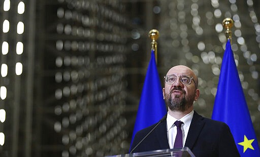 European Council President Charles Michel speaks during a media conference after an EU summit by video conference in Brussels, Thursday, March 26, 2020. Following the informal video conference, members of the European Council adopted a statement on the EU actions in response to the COVID-19 outbreak. The new coronavirus causes mild or moderate symptoms for most people, but for some, especially older adults and people with existing health problems, it can cause more severe illness or death. (Francois Walschaerts, Pool Photo via AP)