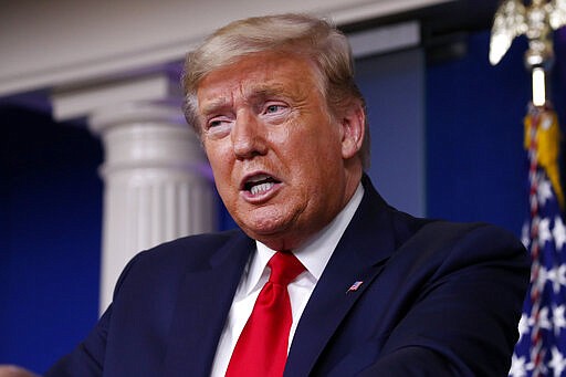 President Donald Trump speaks about the coronavirus in the James Brady Briefing Room, Thursday, March 26, 2020, in Washington. (AP Photo/Alex Brandon)