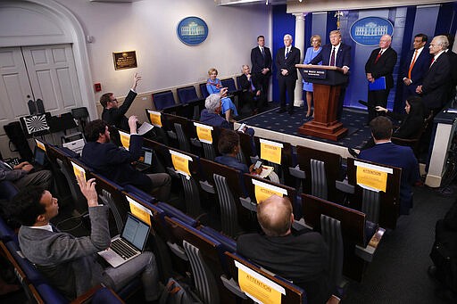 President Donald Trump speaks about the coronavirus in the James Brady Press Briefing Room, Friday, March 27, 2020, in Washington. (AP Photo/Alex Brandon)