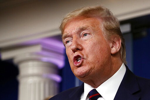 President Donald Trump speaks about the coronavirus in the James Brady Press Briefing Room, Friday, March 27, 2020, in Washington. (AP Photo/Alex Brandon)