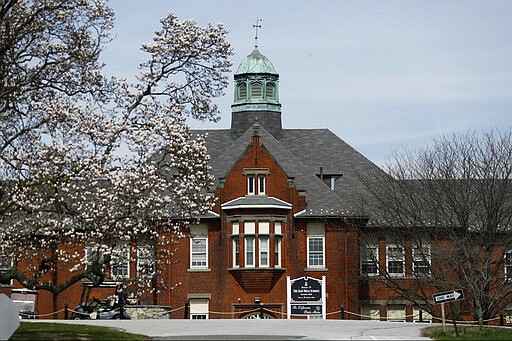 The Glen Mills Schools is seen, Friday, March 27, 2020, in Glen Mills, Pa. The shuttered reform school for boys in suburban Philadelphia may be used as a medical overflow facility as coronavirus cases increase and hospitals are pressed for space. (AP Photo/Matt Slocum)