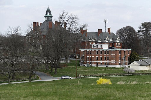 The Glen Mills Schools is seen, Friday, March 27, 2020, in Glen Mills, Pa. The shuttered reform school for boys in suburban Philadelphia may be used as a medical overflow facility as coronavirus cases increase and hospitals are pressed for space. (AP Photo/Matt Slocum)