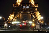 Eiffel Tower says "Merci" to health workers fighting virus