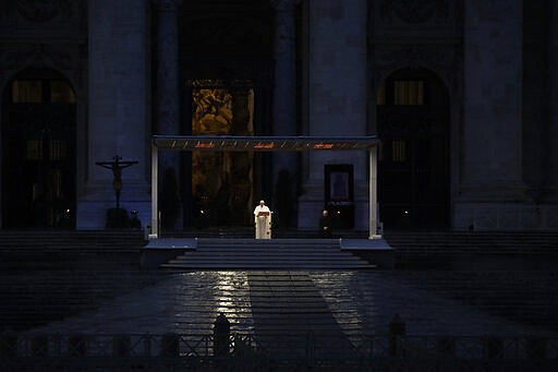 Pope Francis delivers the Urbi and Orbi prayer (Latin for To the City and To the World) in an empty St. Peter's Square, at the Vatican, Friday, March 27, 2020. Praying in a desolately empty St. Peter's Square, Pope Francis on Friday likened the coronavirus pandemic to a storm laying bare illusions that people can be self-sufficient and instead finds &quot;all of us fragile and disoriented&quot; and needing each other's help and comfort. The new coronavirus causes mild or moderate symptoms for most people, but for some, especially older adults and people with existing health problems, it can cause more severe illness or death. (AP Photo/Alessandra Tarantino)