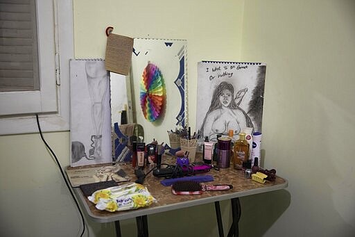 This Feb. 18, 2020 photo, shows the dresser of transgender woman Malak el-Kashif in her bedroom, in Cairo, Egypt. &quot;When you declare you are different, you should get ready for war. A big war,&quot; she said. &quot;The society will stomp on you and treat you like you are the enemy.&quot; (AP Photo/Nariman El-Mofty)