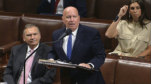 In this image from video, Rep. Kevin Brady, R-Texas, speaks on the floor of the House of Representatives at the U.S. Capitol in Washington, Friday, March 27, 2020. (House Television via AP)