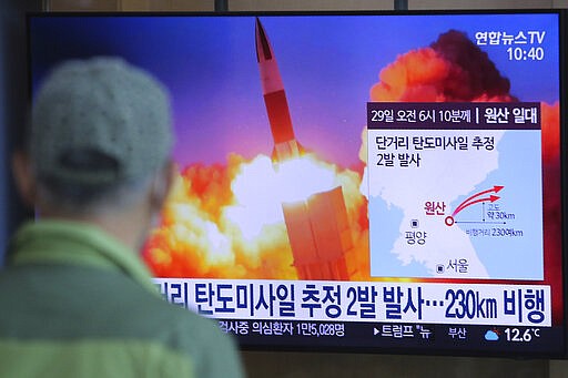 A man watches a TV screen showing a file image of North Korea's missile launch during a news program at the Seoul Railway Station in Seoul, South Korea, Sunday, March 29, 2020. North Korea on Sunday fired two suspected ballistic missiles into the sea, South Korea said, calling it &quot;very inappropriate&quot; at a time when the world is battling the coronavirus pandemic. The Korean letters read: &quot; North Korea launched two suspected ballistic missiles into the sea.&quot; (AP Photo/Ahn Young-joon)