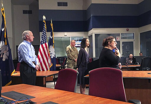 South Carolina Gov. Henry McMaster listens as State Epidemiologist Linda Bell gives an update on the state&#146;s response to the coronavirus at the South Carolina Emergency Operations Center in West Columbia, S.C., Thursday, March 26, 2020. McMaster said he is not ready to issue a stay at home order for the entire state because residents are following instructions on social distancing. (AP Photo /Jeffrey Collins)