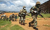Virus prevention measures turn violent in parts of Africa