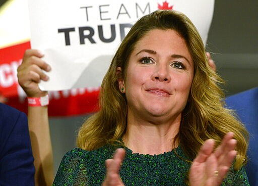 FILE - In this Oct. 11, 2019, file photo, Sophie Gregoire Trudeau attends a rally for her husband, Canadian Prime Minister Justin Trudeau, in Burnaby, British Columbia. Trudeau's office says Sophie Gregoire Trudeau has tested positive for the coronavirus. (Frank Gunn/The Canadian Press via AP, File)