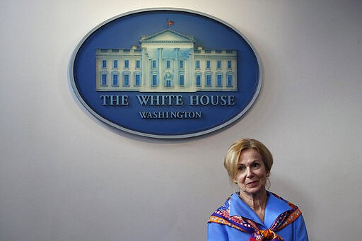 Dr. Deborah Birx, White House coronavirus response coordinator waits for President Donald Trump to arrive and speak about the coronavirus in the James Brady Press Briefing Room, Friday, March 27, 2020, in Washington.  Birx has emerged as one of the most important voices in the administration&#146;s response to the coronavirus pandemic, spelling out the implications of the virus in personal terms while attempting to reassure Americans that it is centering its response to the pandemic with a data-driven mindset. (AP Photo/Alex Brandon)