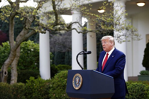 President Donald Trump speaks during a coronavirus task force briefing in the Rose Garden of the White House, Sunday, March 29, 2020, in Washington. (AP Photo/Patrick Semansky)