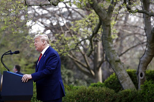 President Donald Trump speaks during a coronavirus task force briefing in the Rose Garden of the White House, Sunday, March 29, 2020, in Washington. (AP Photo/Patrick Semansky)