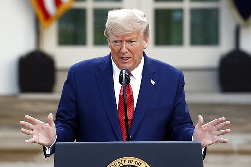 President Donald Trump speaks during a coronavirus task force briefing in the Rose Garden of the White House, Sunday, March 29, 2020, in Washington. (AP Photo/Patrick Semansky)