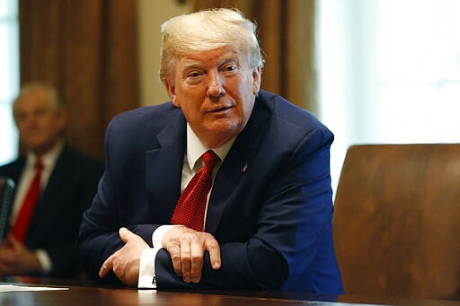 President Donald Trump speaks during a meeting with supply chain distributors in the Cabinet Room of the White House, Sunday, March 29, 2020, in Washington. (AP Photo/Patrick Semansky)