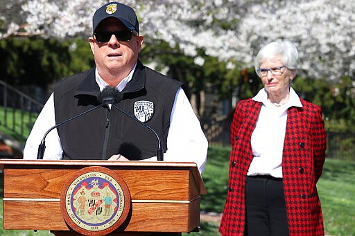 Maryland Gov. Larry Hogan announces a &quot;stay-at-home&quot; directive during a news conference on Monday, March 30, 2020, in Annapolis, Md. Hogan said no Maryland resident should be leaving home unless it is for an essential job or for an essential reason such as obtaining food, medicine or urgent medical attention. The order was set to go into effect at 8 p.m. Monday.(AP Photo/Brian Witte)