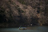 AP PHOTOS: Cherry blossoms, empty stores in virus-hit Japan