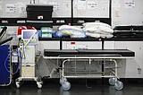How would overwhelmed hospitals decide who to treat first?