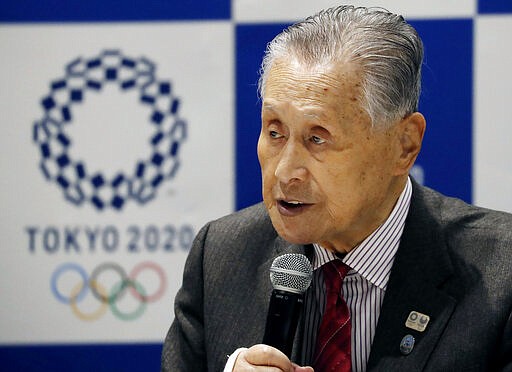 Tokyo 2020 Organizing Committee President Yoshiro Mori delivers a speech during the Tokyo 2020 Executive Board Meeting in Tokyo, Japan Monday, March 30, 2020.  Mori said Monday he expects to talk with IOC President Thomas Bach this week about rescheduling the games for next year. (Issei Kato/Pool Photo via AP)