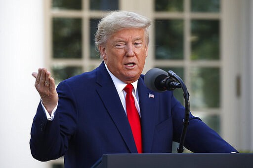 President Donald Trump speaks about the coronavirus in the Rose Garden of the White House, Monday, March 30, 2020, in Washington. (AP Photo/Alex Brandon)