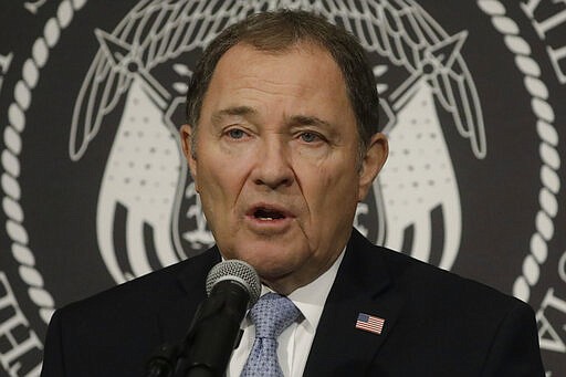 Utah Gov. Gary Herbert shares updates during a COVID-19 pandemic press conference at the Utah State Capitol Tuesday, March 31, 2020, in Salt Lake City. (AP Photo/Rick Bowmer, Pool)